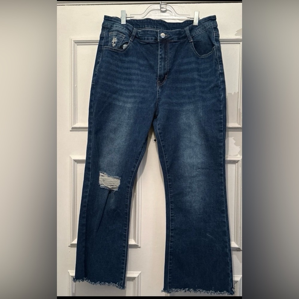 Blue jeans. Bootcut. Size 2XL (16). Fits like 18P. Designer rips and tears.